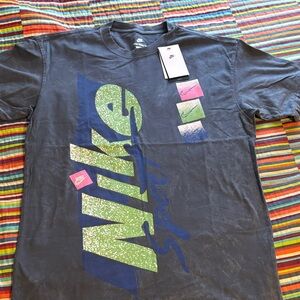 Nike Graphic Tee with Green/Blue Accents vintage graphic size medium loose fit